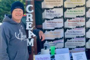 Todd Hindman, owner of Udder Delights, poses at his booth at the Homer Farmers Market during Memorial Weekend in Homer, Alaska. Photo by Christina Whiting