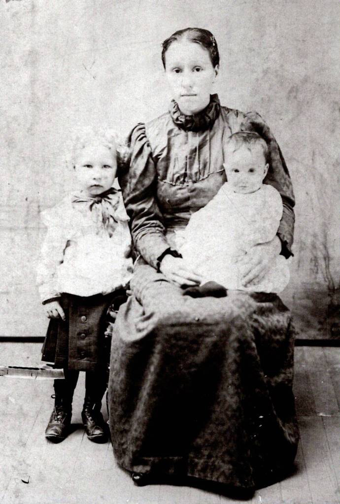 Photo courtesy of the Brennan Family Collection
This 1901 photo shows May King with her two eldest children, Floyd (standing) and Mary (on Mays lap).