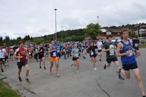 Runners participating in the Homer Spit Run 10K to the Bay race begin the course at Homer High School on Saturday, June 24, 2023 in Homer, Alaska. (Delcenia Cosman/Homer News)