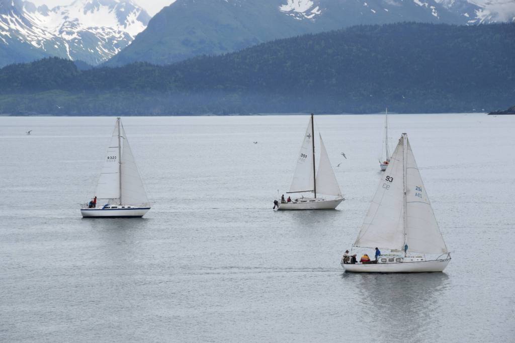 Members of the Homer Yacht Club start the course set for the Homer Yacht Club Regatta on Saturday, June 26, 2023 in the Kachemak Bay below Lands End Resort in Homer, Alaska. Homer Yacht Club Commodore Craig Forrest is on number 93, the Arctica. (Delcenia Cosman/Homer News)