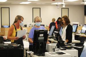 Kenai Peninsula Borough Clerk Johni Blankenship oversees the testing of voting equipment ahead of the Oct. 5, 2021, municipal election on Thursday, Sept. 9, 2021, in Soldotna, Alaska. (Ashlyn OHara/Peninsula Clarion)