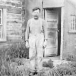 Windy Wagner poses in front of his cabin at Mile 6 of the Kenai River in this undated photo from the Knackstedt Collection.