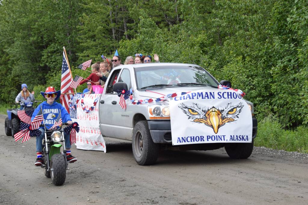 The Chapman School float makes it way down School Street during the Anchor Point Fourth of July parade on Tuesday, July 4, 2023 in Anchor Point, Alaska. (Delcenia Cosman/Homer News)