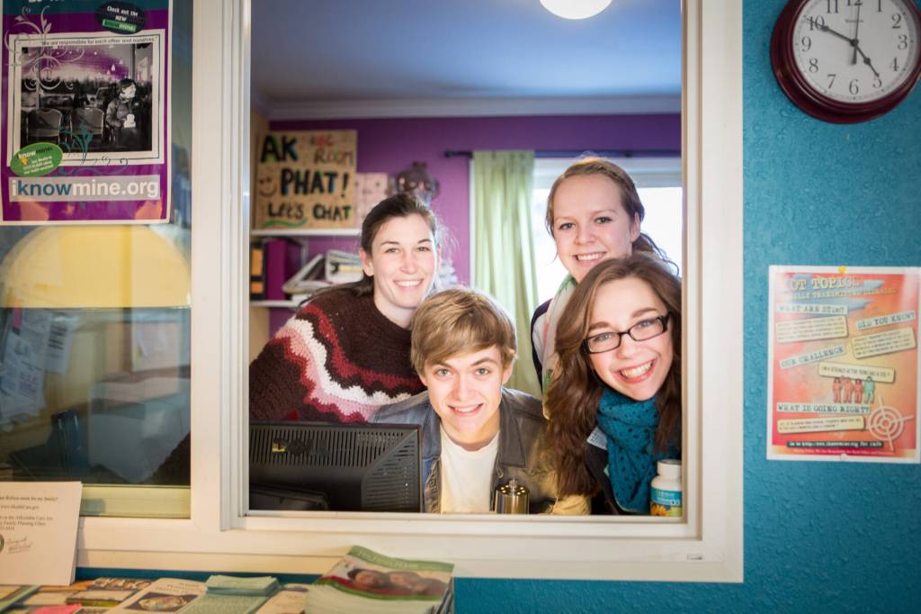 Kachemak Bay Family Planning Clinic Peer Education Coordinator Tyler Schileman is photographed with past Peer Educators Hadley Glidden and Warren Baxter. Photo courtesy of KBFPC