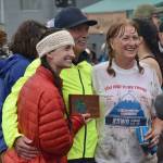 Denali Foldager-Strabel and parents Flip and Patti Foldager pose for a photo at Mount Marathon Race on Tuesday, July 4, 2023, in Seward, Alaska. (Photo by Jeff Helminiak/Peninsula Clarion)