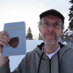 Photos provided by Brian George Smith
Author Brian George Smith poses with his book, Ida Mae Joy: Gold Dust Dreams, published in 2021.