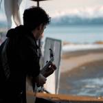 Silas Luke Jones performs at the Homer Chamber of Commerce Winter King Salmon Derby on the Homer Spit in Feb. 2023 in Homer, Alaska. Photo by Noah Douglas Visuals