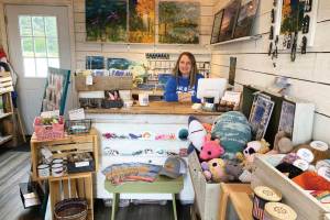 Homer artist and owner of 59 North Creations, Tracy Hansen, is photographed in July 2023 in her shop at the base of the Homer Spit in Homer, Alaska. Photo by Christina Whiting