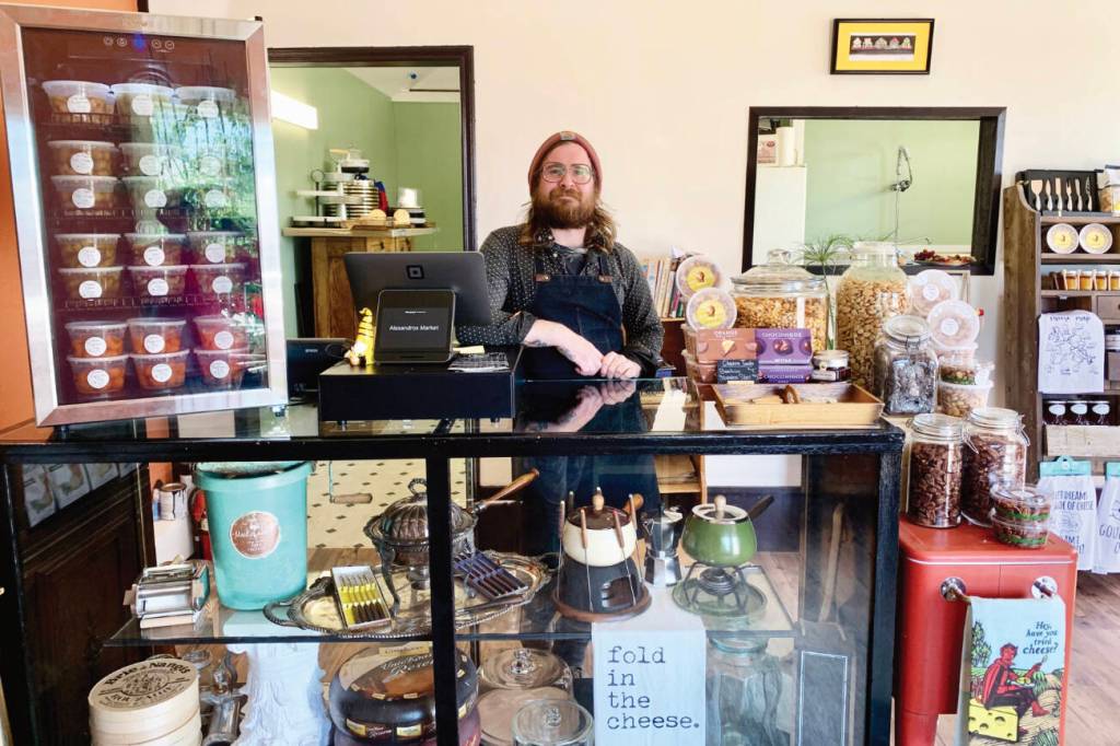 Community member Jacob Chrisman, photographed on Thursday, July 20, 2023, is the owner of Alasandro's Market, a gourmet market specializing in imported cheeses, dry-cured meats and charcuterie platters, that opened on Heath Street in June. Photo by Christina Whiting