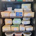 An assortment of cheeses, olives and other specialty items that rotate through Alasandros Market on Heath Street is on display at the shop. Photo courtesy of Jacob Chrisman