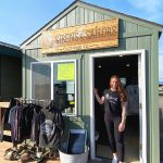 Jacqueline Burke is photographed in front of her store Sirens & Sailors on the Homer Spit in the summer of 2022 in Homer, Alaska. Photo provided by Jacqueline Burke
