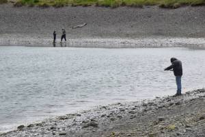 Local youth anglers participate in the 15-and-under king salmon fishery on Saturday, June 3, 2023, at the Nick Dudiak Fishing Lagoon in Homer, Alaska. (Delcenia Cosman/Homer News)