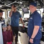 Homer family visits the Bridge of the Naushon with Lt. Singletary.  Emilie Springer/ Homer News.