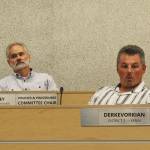 Assembly members Lane Chesley (left) and Richard Derkevorkian (right) participate in a borough assembly meeting on Tuesday, Aug. 1, 2023, in Soldotna, Alaska. (Ashlyn OHaara/Peninsula Clarion)