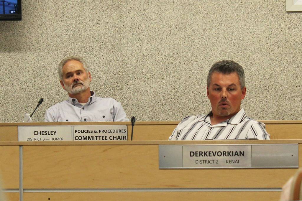Assembly members Lane Chesley (left) and Richard Derkevorkian (right) participate in a borough assembly meeting on Tuesday, Aug. 1, 2023, in Soldotna, Alaska. (Ashlyn OHaara/Peninsula Clarion)