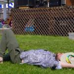 An attendee dozes between performances on the Ocean Stage at Salmonfest in Ninilchik, Alaska, on Friday, Aug. 4, 2023. (Jake Dye/Peninsula Clarion)
An attendee dozes between performances on the Ocean Stage at Salmonfest in Ninilchik, Alaska, on Friday, Aug. 4, 2023. (Jake Dye/Peninsula Clarion)