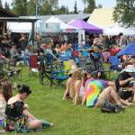 Salmonfest attendees listen to music at the Ocean Stage on Friday, Aug. 4, 2023 in Ninilchik, Alaska. (Ashlyn OHara/Peninsula Clarion)