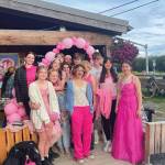 A group of high school students gets their pink on at the 7:15 p.m. evening showing of Barbie on Sunday, Aug. 13, 2023 at the Homer Theatre in Homer, Alaska. (Emilie Springer/Homer News)