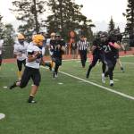 Barrows Gabriel Ortilla faces off against incoming Mariners in the fourth quarter of the home opener game on Saturday, Aug. 12, 2023 in Homer, Alaska. (Delcenia Cosman/Homer News)