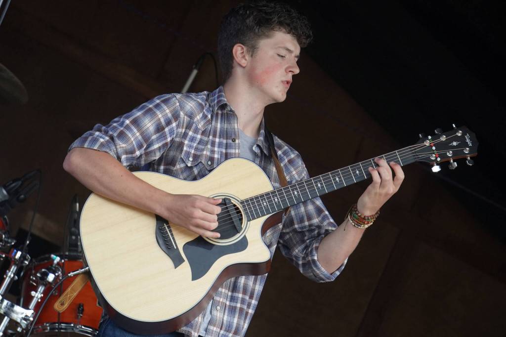 Silas Luke Jones performs on the Ocean Stage at the Kenai Peninsula Fair in Ninilchik, Alaska, on Friday, Aug. 11, 2023. (Jake Dye/Peninsula Clarion)