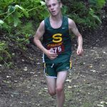Seward freshman Ridge Conant finishes third in the freshman-sophomore boys race at the Class Races on Monday, Aug. 14, 2023, at Nikiski High School in Nikiski, Alaska. (Photo by Jeff Helminiak/Peninsula Clarion)