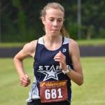 Soldotna sophomore Tania Boonstra runs to victory in the freshman-sophomore girls race at the Class Races on Monday, Aug. 14, 2023, at Nikiski High School in Nikiski, Alaska. (Photo by Jeff Helminiak/Peninsula Clarion)