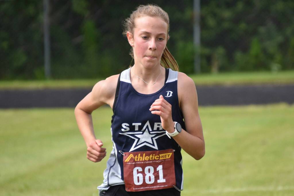 Soldotna sophomore Tania Boonstra runs to victory in the freshman-sophomore girls race at the Class Races on Monday, Aug. 14, 2023, at Nikiski High School in Nikiski, Alaska. (Photo by Jeff Helminiak/Peninsula Clarion)