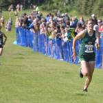 Colonys Ella Hopkins runs to victory in the girls varsity race at the Ted McKenney Invitational on Saturday, Aug. 19, 2023, at Tsalteshi Trails just outside of Soldotna, Alaska. (Photo by Jeff Helminiak/Peninsula Clarion)