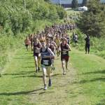 Photo by Jeff Helminiak/Peninsula Clarion
Erik Thompson of Juneau-Douglas: Yadaa.at Kale leads the pack up a hill at the beginning of the boys varsity race.