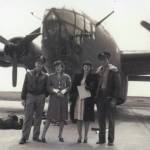 Photo courtesy of the Lancashire Family Collection
Larry and Rusty Lancashire (at left) pose in front of a B-24 bomber in the early 1940s with another unidentified couple. Larry was a B-24 co-pilot during World War II.