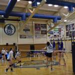 Sitka blocks a serve from Homer opposite hitter Alivia Fefelov (right) at the varsity nonconference game on Thursday, Aug. 24, 2023 in Homer, Alaska. (Emilie Springer/Homer News)