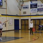 Middle blocker Goldie Hill serves the ball at the varsity game versus Soldotna on Friday, Sept. 1, 2023 in Homer, Alaska. (Delcenia Cosman/Homer News)