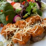 Slow spaghetti sauce and turkey meatballs are loaded with enough cheese and herbs to change your mind about ground turkey. (Photo by Tressa Dale/Peninsula Clarion)