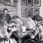 The Lancashire family shares a meal in their original homestead cabin. (1954 photo by Bob and Ira Spring for Better Homes & Garden magazine)