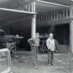 Cheechako News photo courtesy of the KPC historic photo repository
Larry Lancashire, left with his pipe, and his helper Charles Easton, pause during the construction of Lancashires potato barn in 1961.