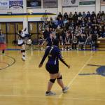 Addison Grimes bumps the ball to her teammates at the varsity game against the Kenai Kardinals on Saturday, Sept. 9. (Delcenia Cosman/Homer News)