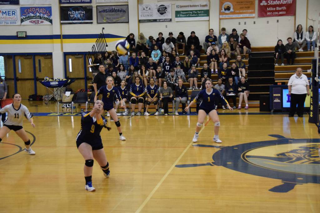 Setter Rebecca Trowbridge bumps the ball at the varsity game against the Kenai Kardinals on Saturday, Sept. 9, 2023 in the Alice Witte Gymnasium at Homer High School in Homer, Alaska. (Delcenia Cosman/Homer News)
