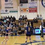 Rebecca Trowbridge sets the ball at the varsity game against the Kenai Kardinals on Saturday, Sept. 9, 2023 in the Alice Witte Gymnasium at Homer High School in Homer, Alaska. (Delcenia Cosman/Homer News)