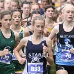 Soldotna's Tania Boonstra runs with the lead pack at the George Plumley XC Invite on Saturday, Sept. 9, 2023, at Palmer High School in Palmer, Alaska. (Photo by Jeremiah Bartz/Frontiersman)