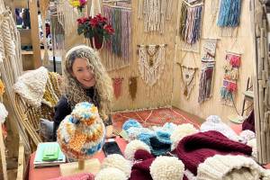 Chelsea Carpenter sells her macraweave creations at the 2022 Nutcracker Faire at Homer High School in Homer, Alaska. Photo provided by Chelsea Carpenter