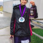 SVT Health and Wellness Coach Jenifer Dickson is awarded the traditional red lantern, painted purple to celebrate recovery, for being the last one to finish at the 5K Run for Recovery on Saturday, Sept. 16, 2023 on the Spit in Homer, Alaska. Photo by Arctic Stills Photography