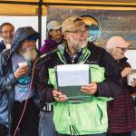 Kachemak Bay Recovery Connection vice president Willy Dunne announces the prize winners at the 5K Run for Recovery after the conclusion of the race on Saturday, Sept. 16, 2023 in front of Kevin Bell Arena on the Spit in Homer, Alaska. Photo by Arctic Stills Photography