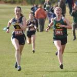 Photo by Jeff Helminiak/Peninsula Clarion
Homers Beatrix McDonough and Sewards Juniper Ingalls sprint to the finish of the Kenai Peninsula Borough girls varsity race Thursday, Sept. 21, 2023, at Tsalteshi Trails just outside of Soldotna, Alaska.