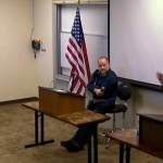 Kelly Cooper (right) answers a question from moderator and Homer Chamber of Commerce board of directors president Michael Daniel (left) during the Kenai Peninsual Borough Assembly candidate forum with Cooper and Heath Smith (center) on Wednesday, Sept. 20, 2023 at Kachemak Bay Campus in Homer, Alaska. Screenshot.