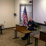 Kelly Cooper (right) answers a question from moderator and Homer Chamber of Commerce board of directors president Michael Daniel (left) during the Kenai Peninsual Borough Assembly candidate forum with Cooper and Heath Smith (center) on Wednesday, Sept. 20, 2023 at Kachemak Bay Campus in Homer, Alaska. Screenshot.
