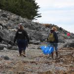 Tina Seaton (right) and other local volunteers check the beach for debris during the CoastWalk clean-up in the Anchor River State Recreation Area on Saturday, Sept. 23, 2023 in Anchor Point, Alaska. (Delcenia Cosman/Homer News)