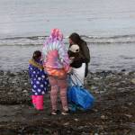 Anchor Point youth comb the beach and pick up garbage and marine debris during the CoastWalk clean-up in the Anchor River State Recreation Area on Saturday, Sept. 23, 2023 in Anchor Point, Alaska. (Delcenia Cosman/Homer News)
