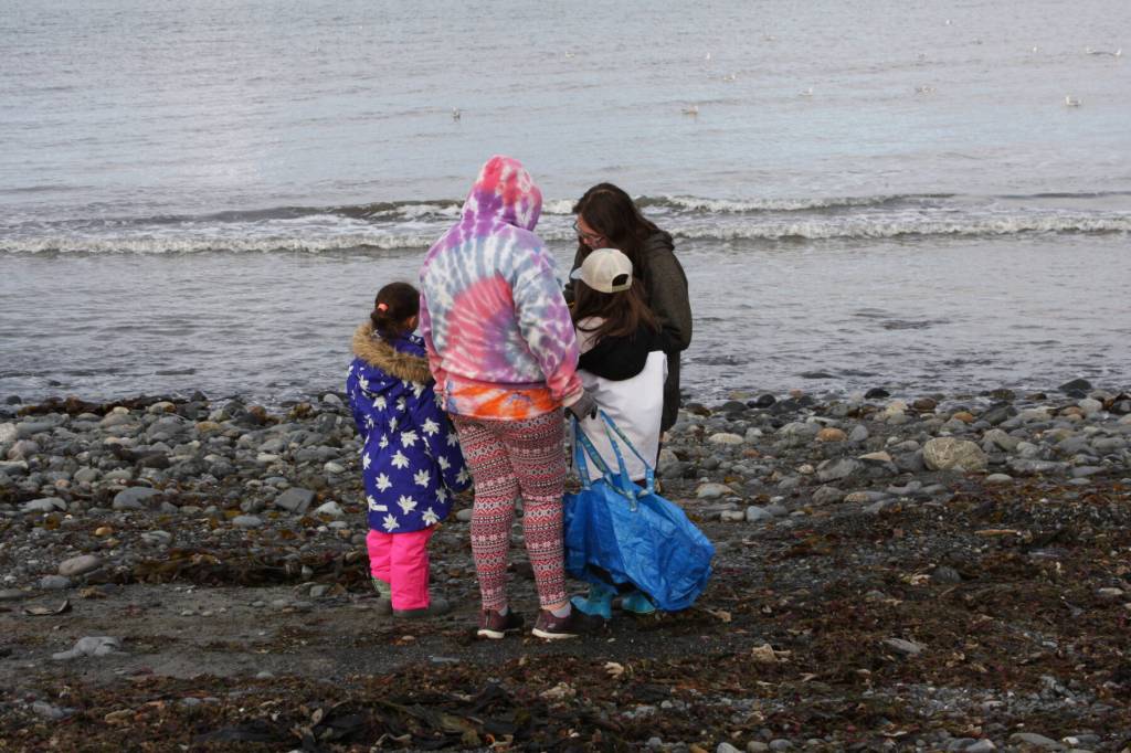 Anchor Point youth comb the beach and pick up garbage and marine debris during the CoastWalk clean-up in the Anchor River State Recreation Area on Saturday, Sept. 23, 2023 in Anchor Point, Alaska. (Delcenia Cosman/Homer News)