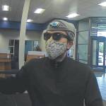 A photo distributed by the Federal Bureau of Investigation shows a man who allegedly robbed the Global Credit Union branch located in Anchorage, Sept. 19, 2023. Tyler Ching, 34, was arrested last week on charges related to robberies at the credit union and an Anchorage bank. (Photo courtesy Federal Bureau of Investigation)