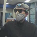 A photo distributed by the Federal Bureau of Investigation shows a man who allegedly robbed the Global Credit Union branch located in Anchorage, Sept. 19, 2023. Tyler Ching, 34, was arrested last week on charges related to robberies at the credit union and an Anchorage bank. (Photo courtesy Federal Bureau of Investigation)